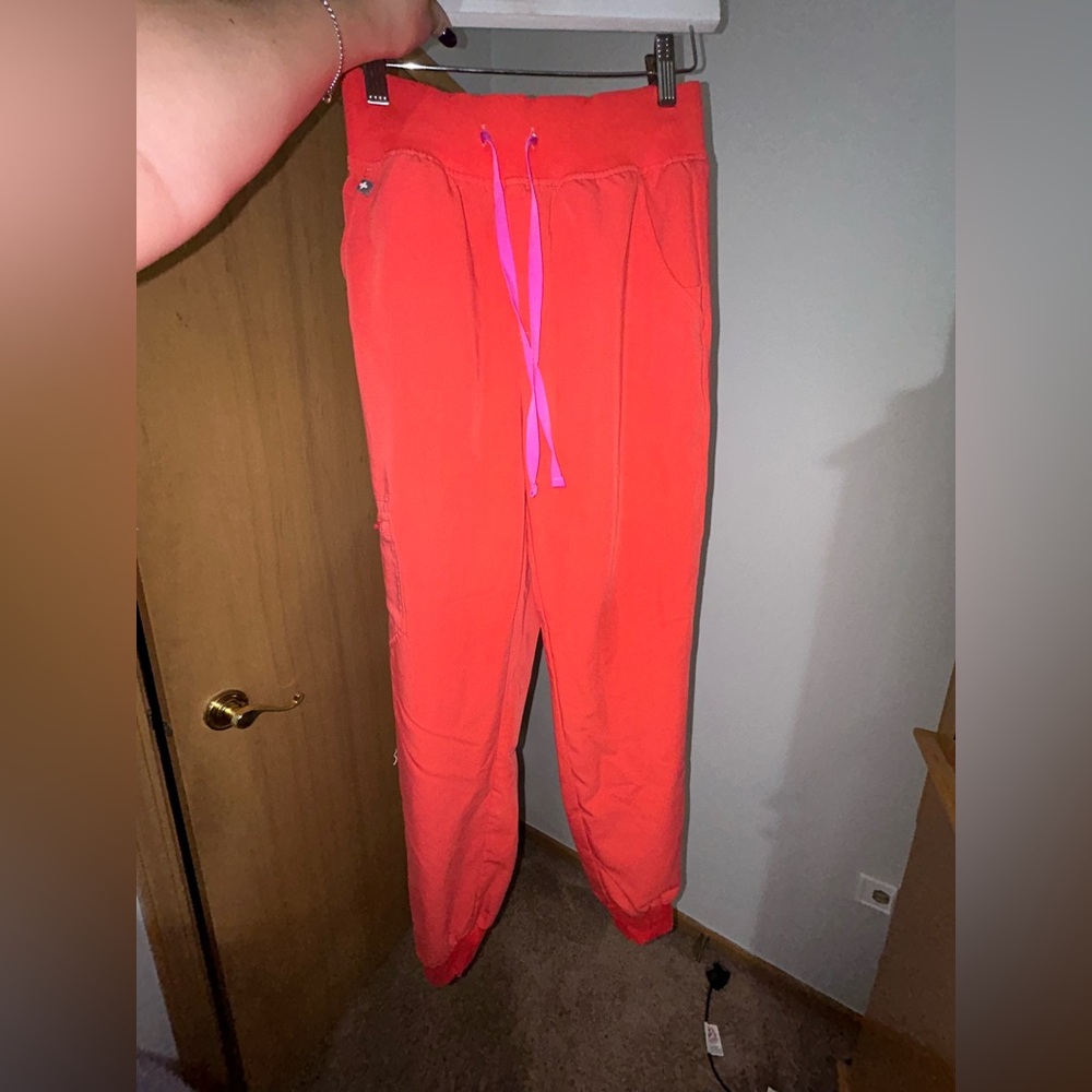 Figs coral and pink/purple joggers (matching under scrubs listed separately)